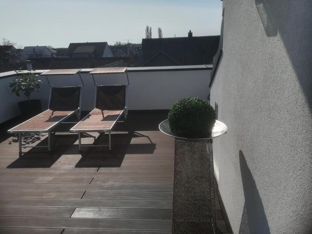 Balkón nebo terasa v ubytování PENTHOUSE Griemann 2 für max 4 Personen mit eigener großer Dachterrasse zum Relaxen!