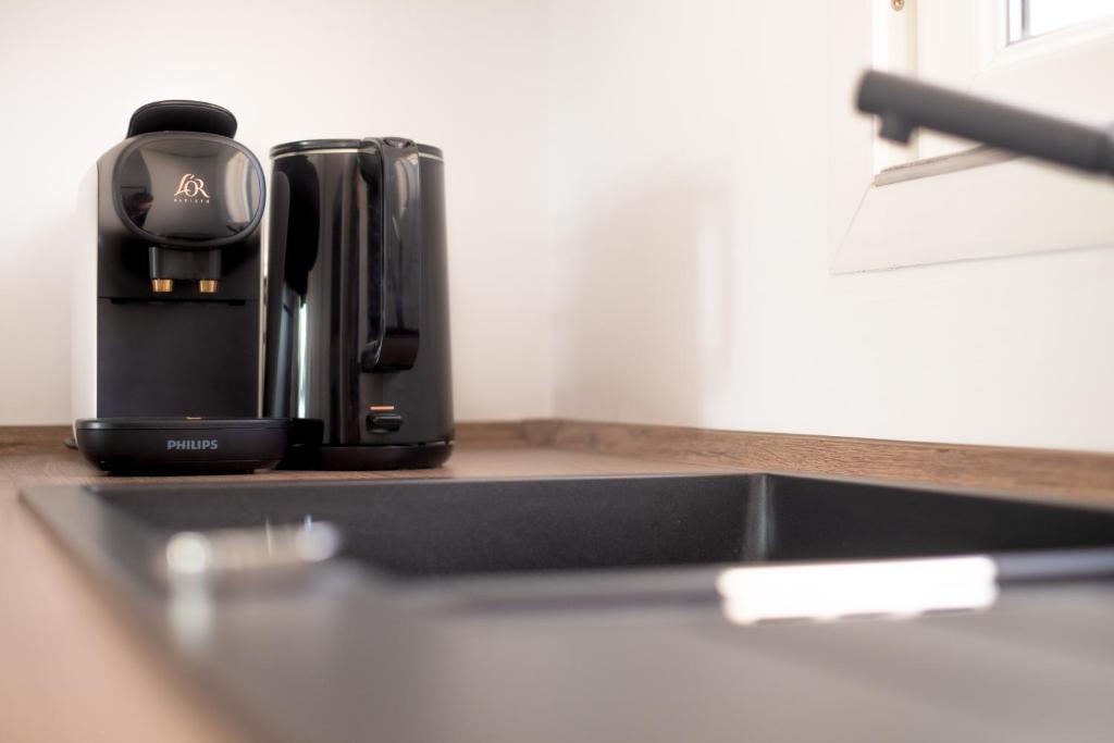 Coffee and tea making facilities at 31 Miraflores Jardin B, gorgeous views, pool, Wifi