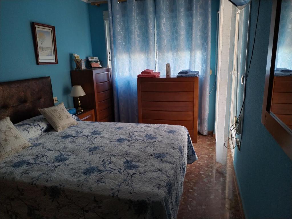 A bed or beds in a room at Habitacion Azul