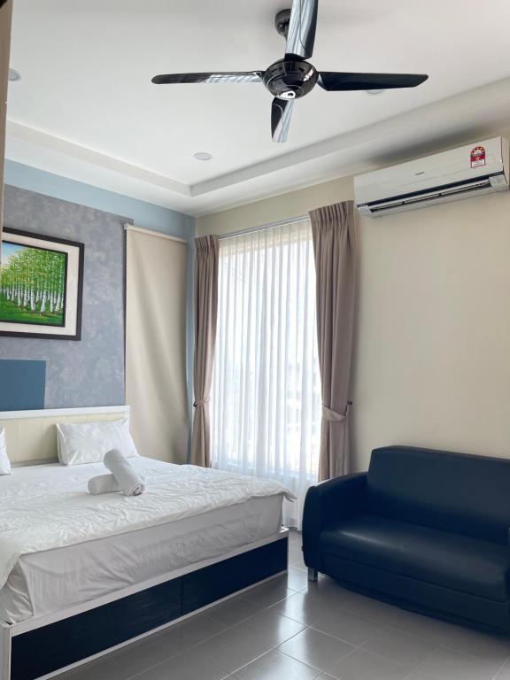 Postel nebo postele na pokoji v ubytování MR Homestay HotelStyle Room Teluk Intan