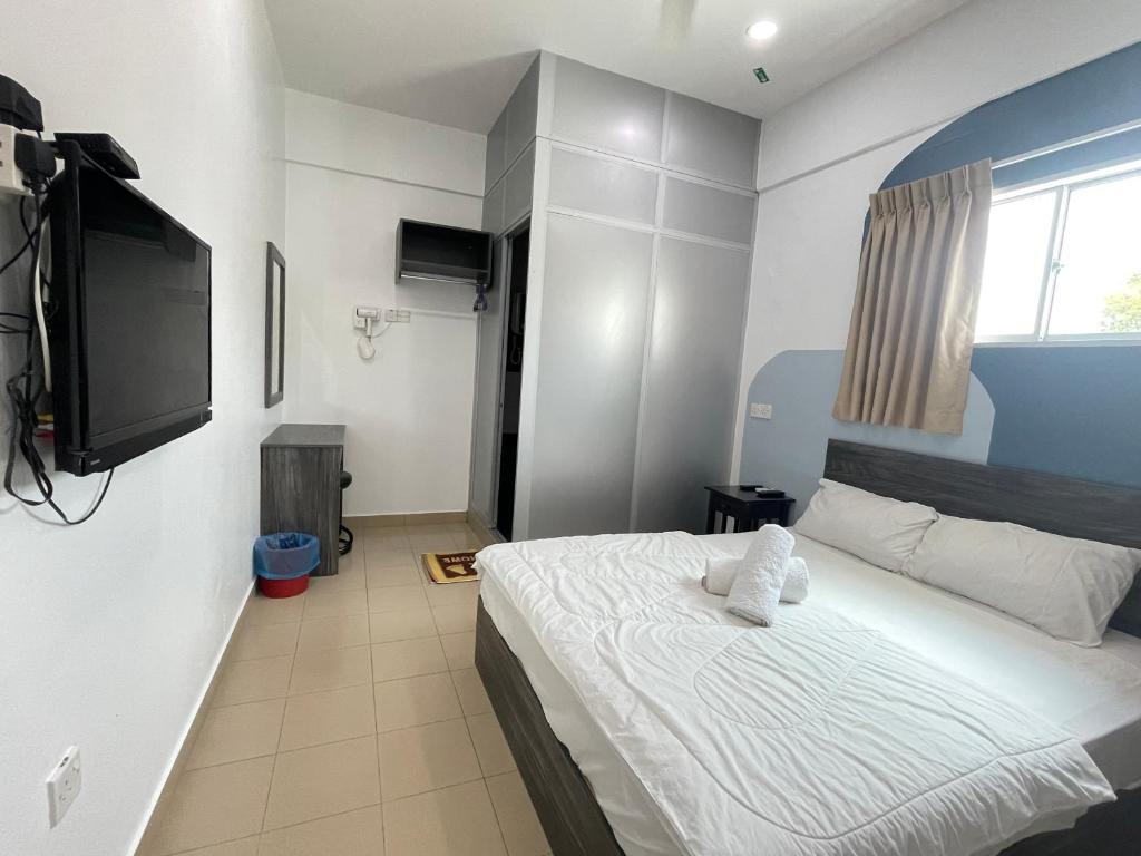 TV a/nebo společenská místnost v ubytování MR Homestay HotelStyle Room Teluk Intan