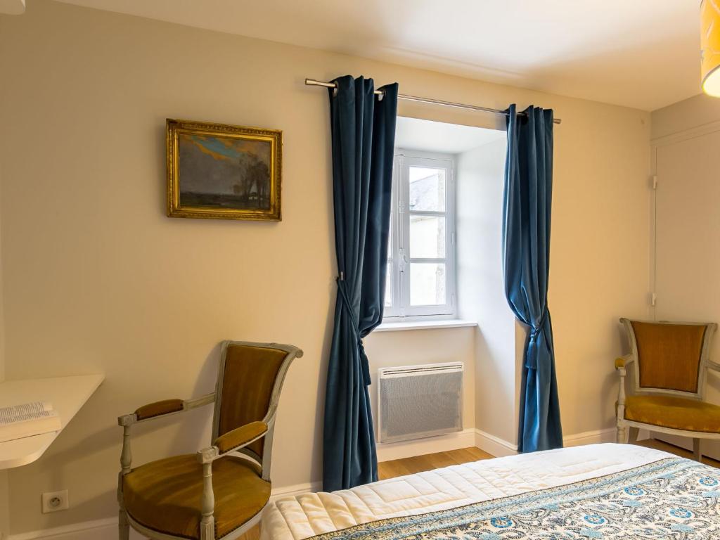Posteľ alebo postele v izbe v ubytovaní Apartment Penguilly by Interhome