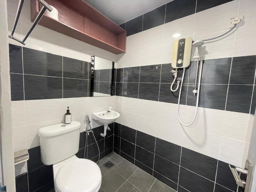 Koupelna v ubytování MR Homestay HotelStyle Room Teluk Intan