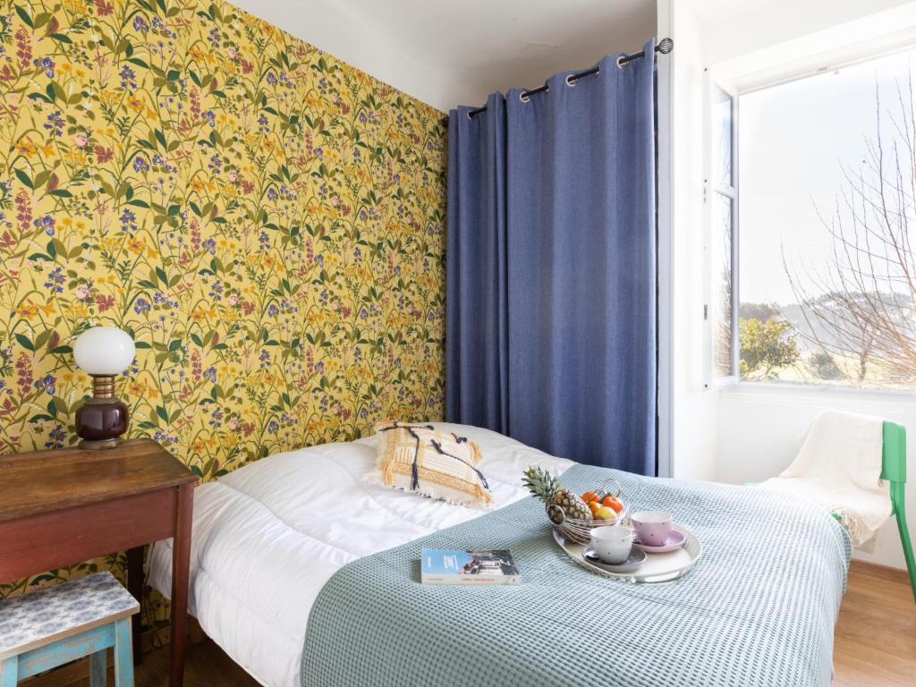 Łóżko lub łóżka w pokoju w obiekcie Apartment Haitze Egoa by Interhome