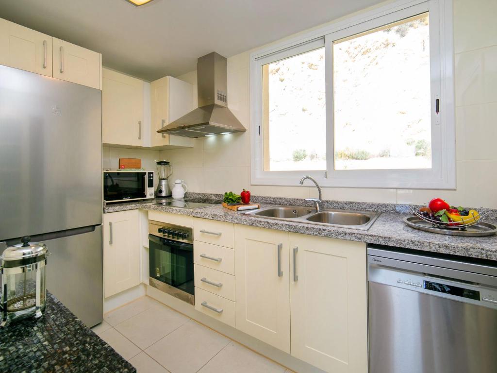 Kuchyň nebo kuchyňský kout v ubytování Apartment Jardines de Altea Hills-5 by Interhome