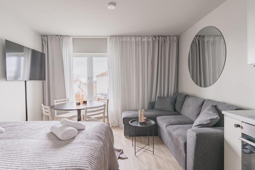 Postel nebo postele na pokoji v ubytování Hotell Hanöhus Hällevik