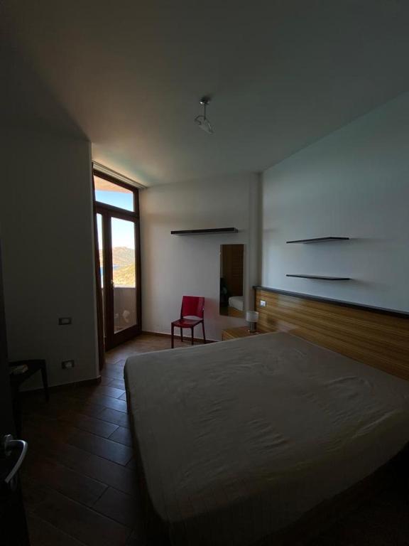 Postel nebo postele na pokoji v ubytování L'angolo di Filo