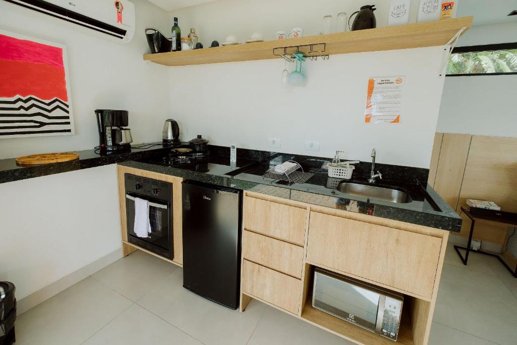 Kuchyň nebo kuchyňský kout v ubytování Reserva Cabanas