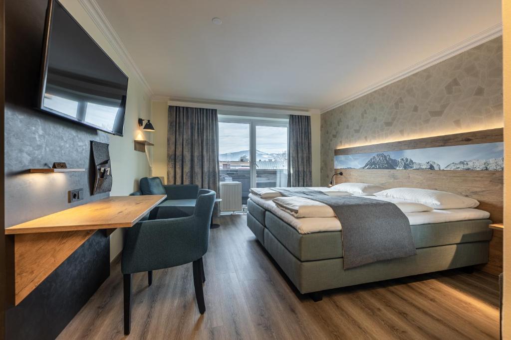 Postel nebo postele na pokoji v ubytování Hotel Fischer