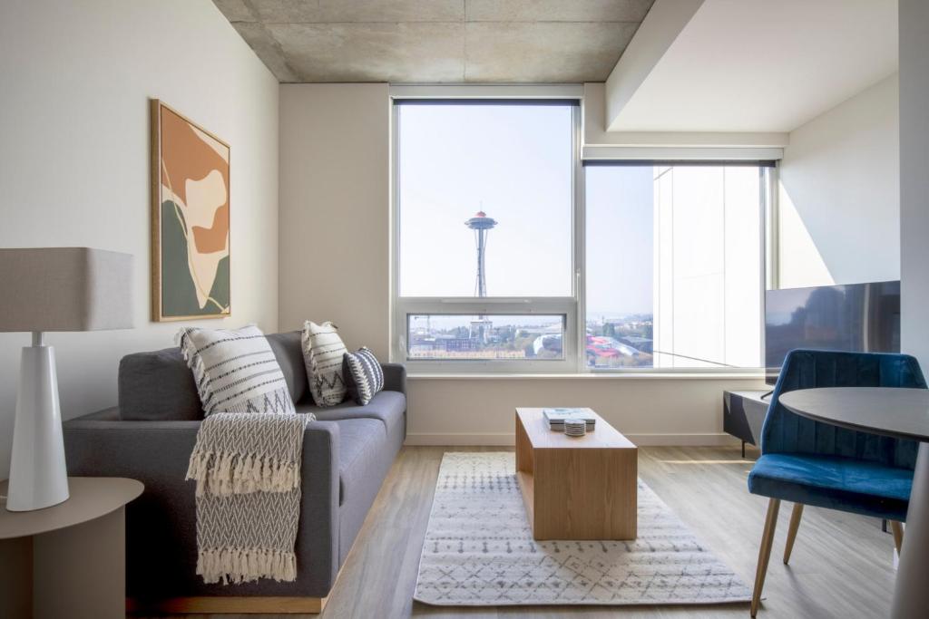 a living room with a couch and a table at South Lake Union 1br w wd roof nr Lake Union SEA-503 in Seattle