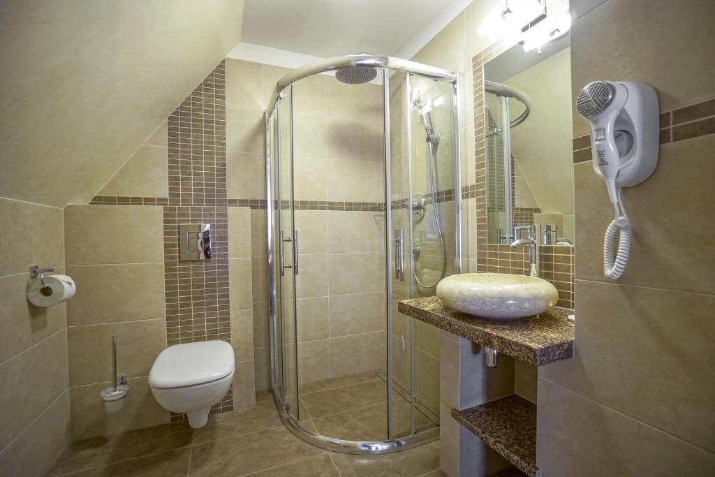 Kúpeľňa v ubytovaní Carlina Hotel & SPA