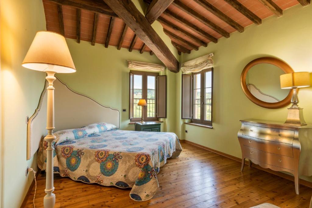 Postel nebo postele na pokoji v ubytování Agriturismo Corte Benedetto