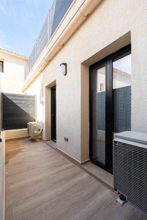 Balkon lub taras w obiekcie Complexe Les Maisons du Parc - 4 maisons standing - Clim Parking 30 pers