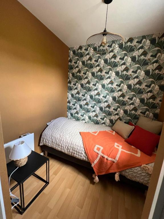 Postel nebo postele na pokoji v ubytování Ty kalon