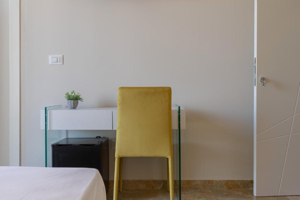 A bed or beds in a room at Il Sovrano