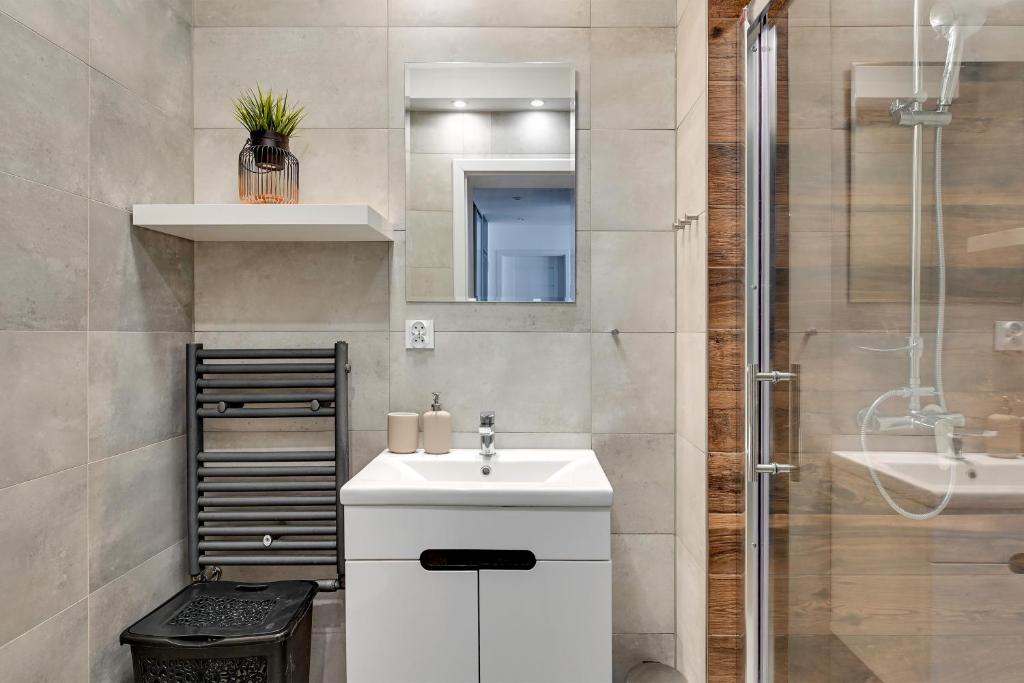 Kúpeľňa v ubytovaní Apartamenty Haffnera by Grand Apartments