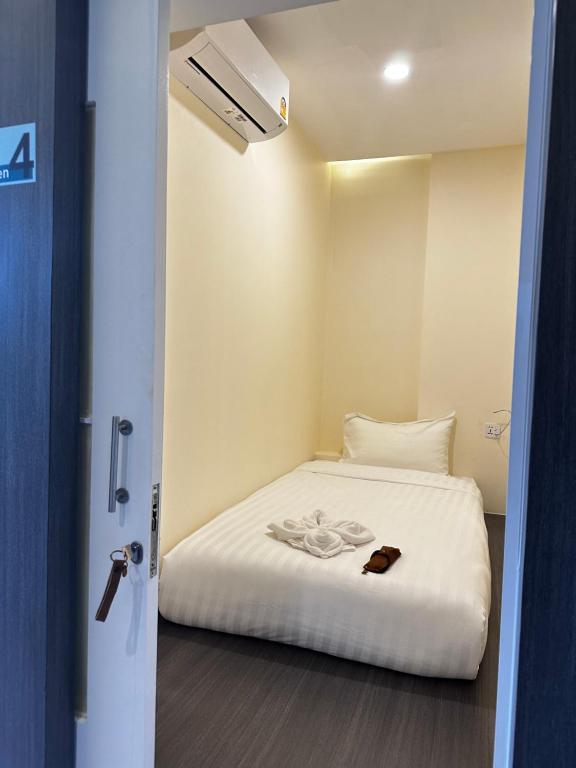 Postel nebo postele na pokoji v ubytování Norm Space Hostel NST