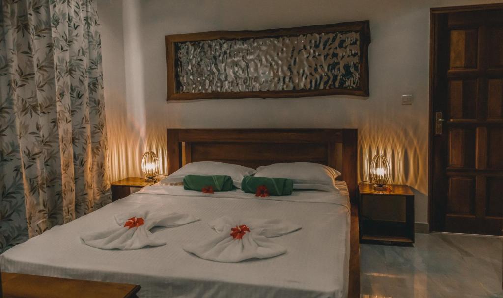 Postel nebo postele na pokoji v ubytování kannel Apartments