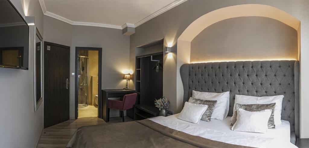 Postel nebo postele na pokoji v ubytování Hotel Rango