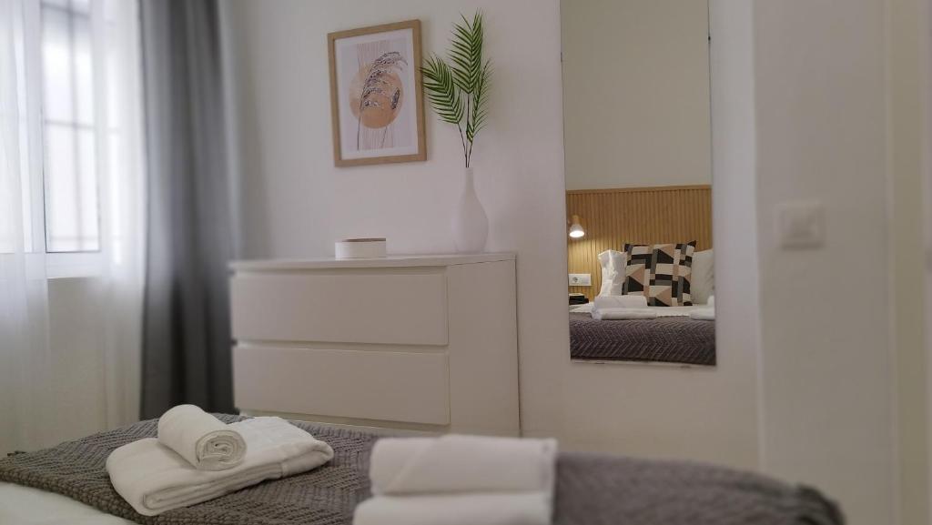 Posteľ alebo postele v izbe v ubytovaní Apartamento Poniente Sanlúcar - Centro