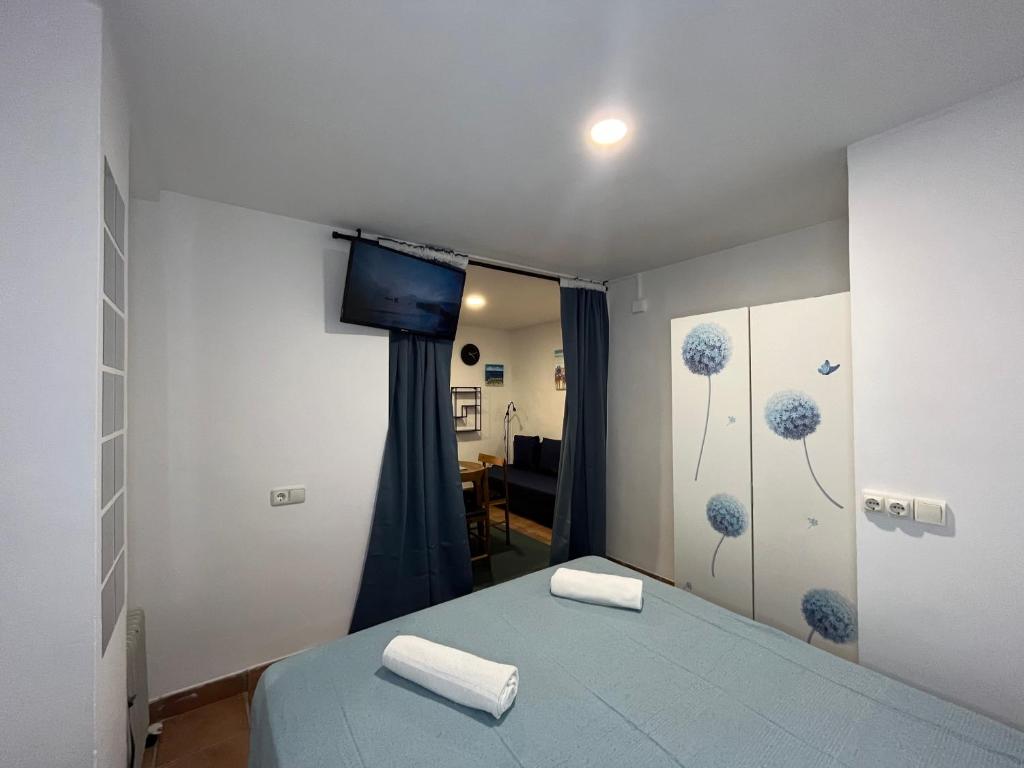 Postel nebo postele na pokoji v ubytování Apartamento Rovellat Casco Antiguo