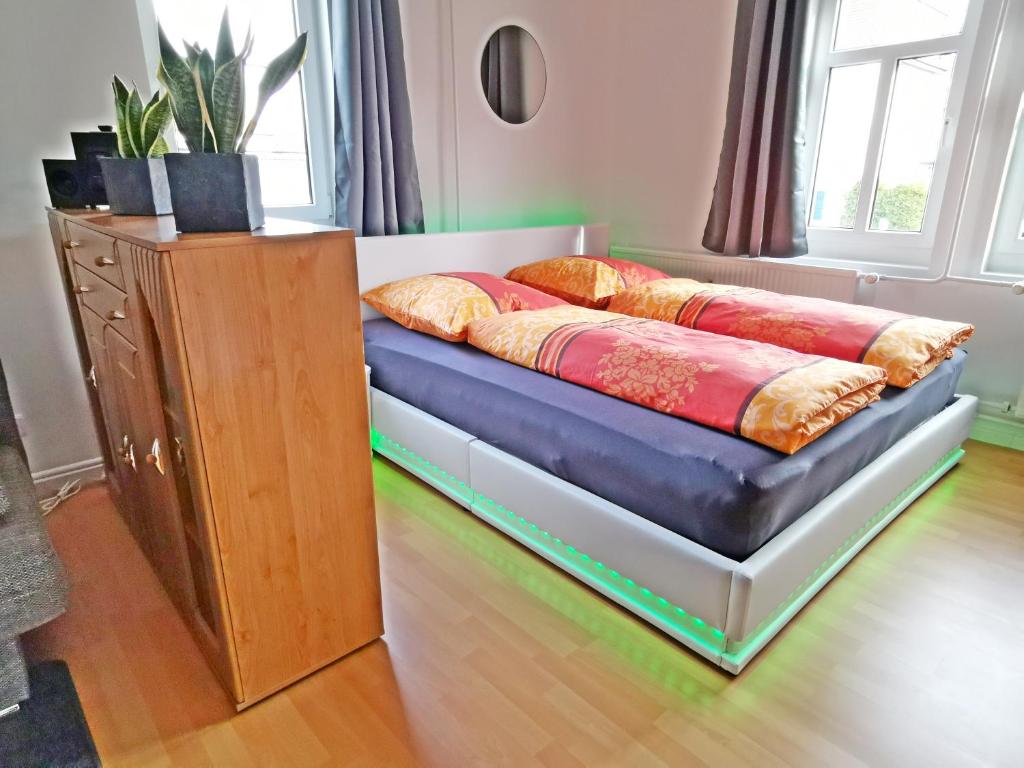 Postel nebo postele na pokoji v ubytování Musashi Apartment 1