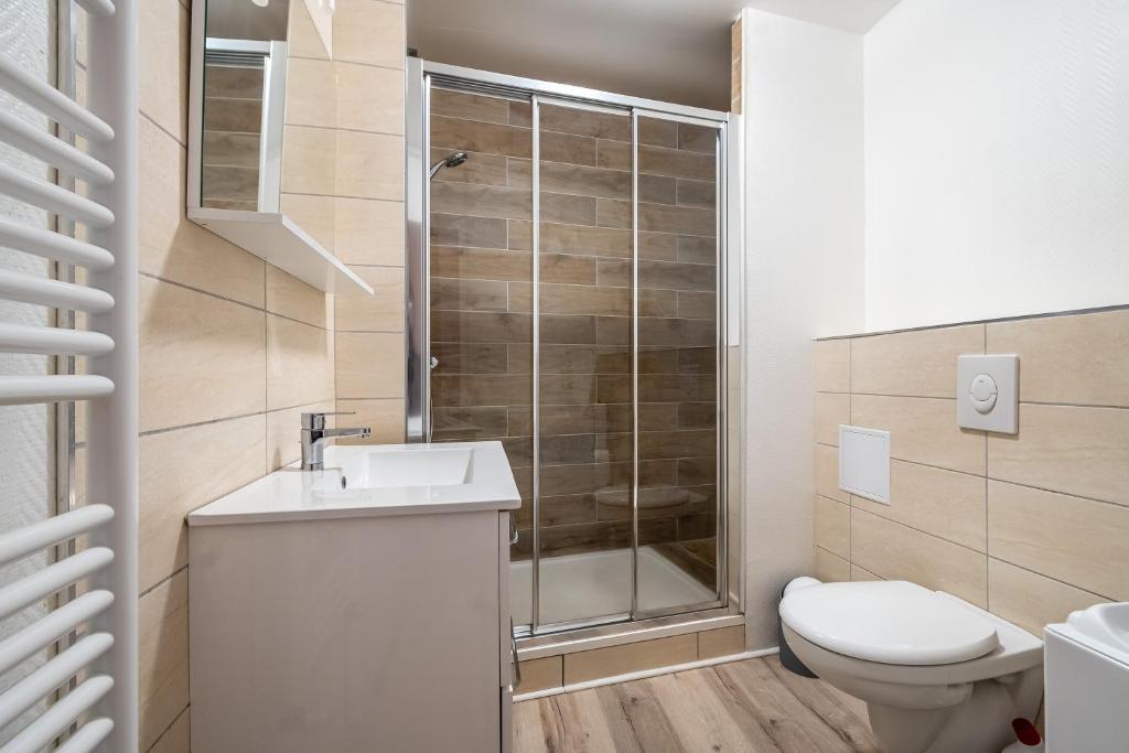 Kúpeľňa v ubytovaní Le 38-GregIMMO-Appart'Hôtel