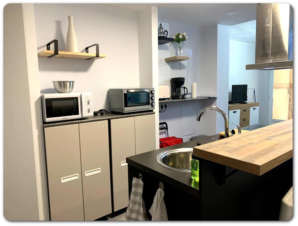Kuchyňa alebo kuchynka v ubytovaní Magnifique Appartement • vue sur mer • Santa Pola