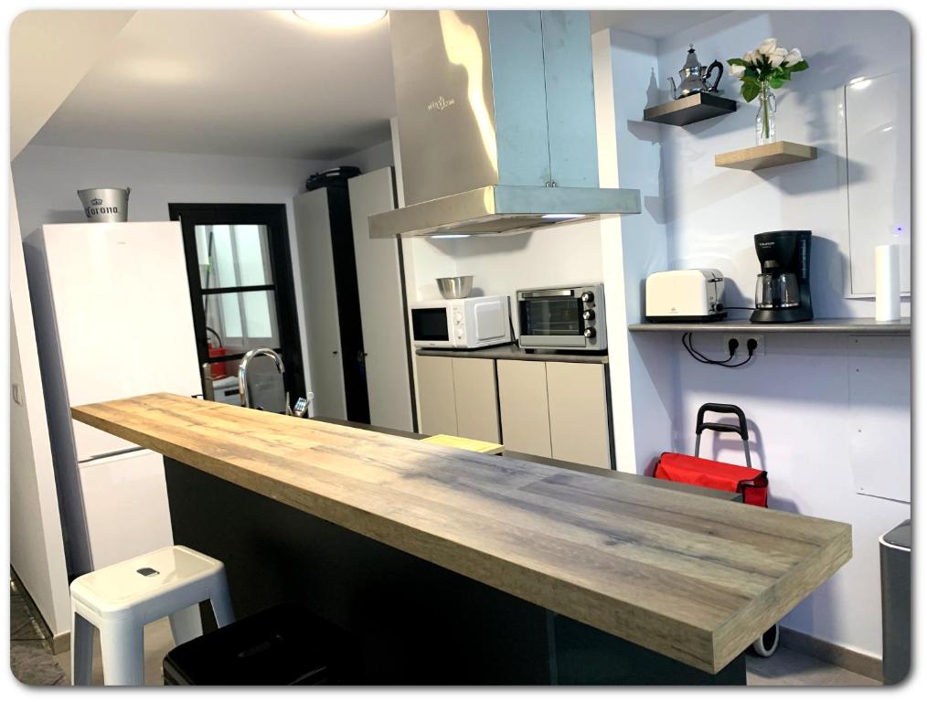 Kuchyňa alebo kuchynka v ubytovaní Magnifique Appartement • vue sur mer • Santa Pola