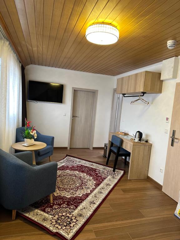 Kuchyň nebo kuchyňský kout v ubytování hotel whiteswan
