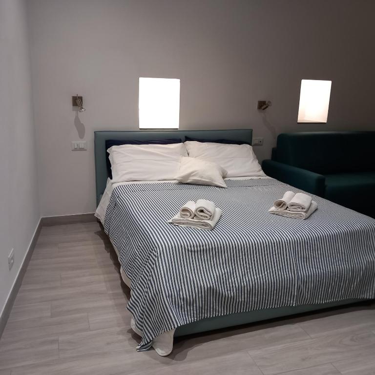 Łóżko lub łóżka w pokoju w obiekcie Casa Isabella De Luxe Studio