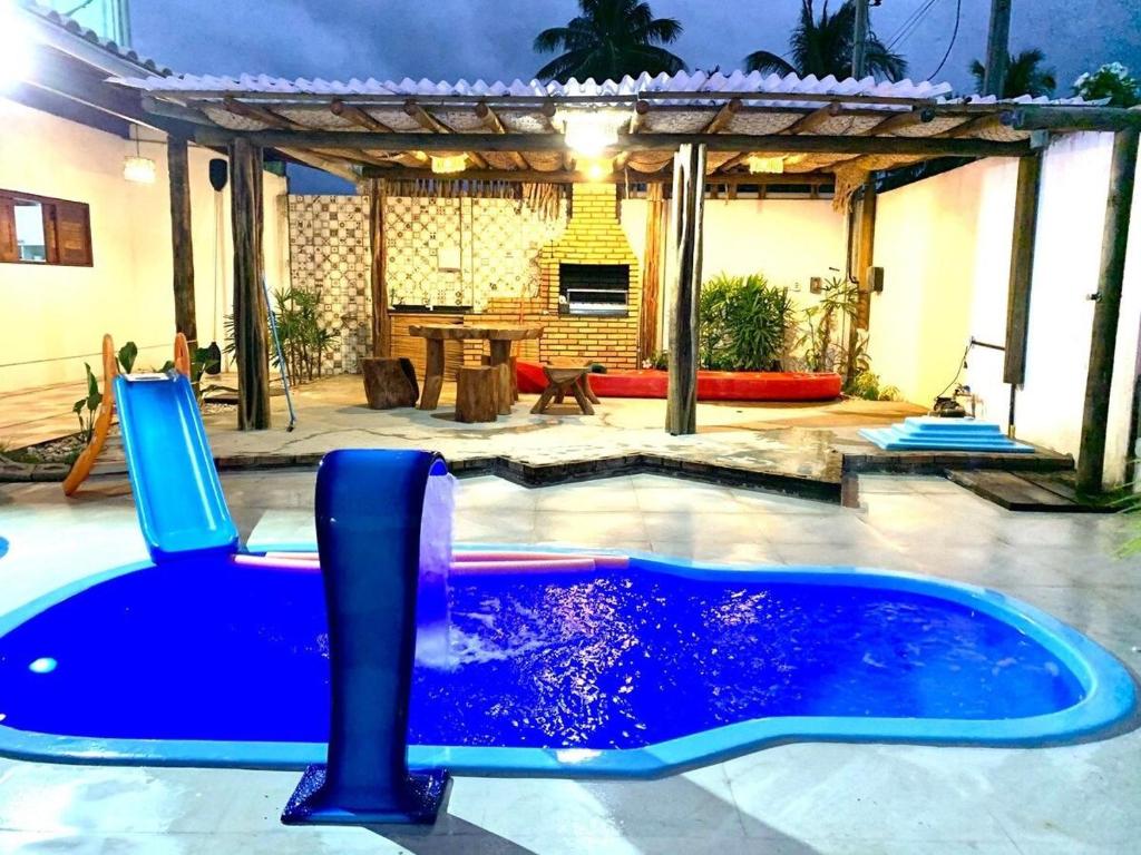 Bassein majutusasutuses Casa Xiê com piscina, churrasqueira e jardim või selle lähedal