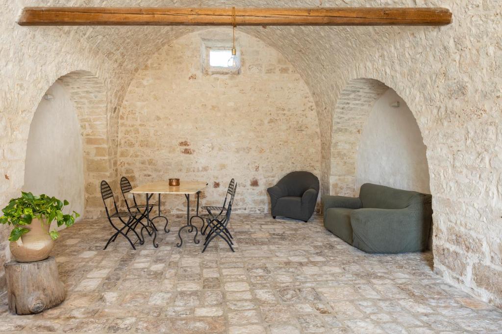 A seating area at Antica Masseria San Benedetto