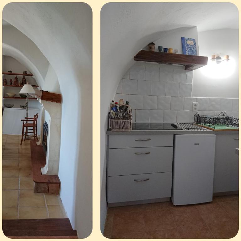 Kuchyň nebo kuchyňský kout v ubytování Gîte en Cévennes du sud, bergerie restaurée au rez de jardin d'une bastide avec piscine, vue exceptionnelle, authenticité et confort