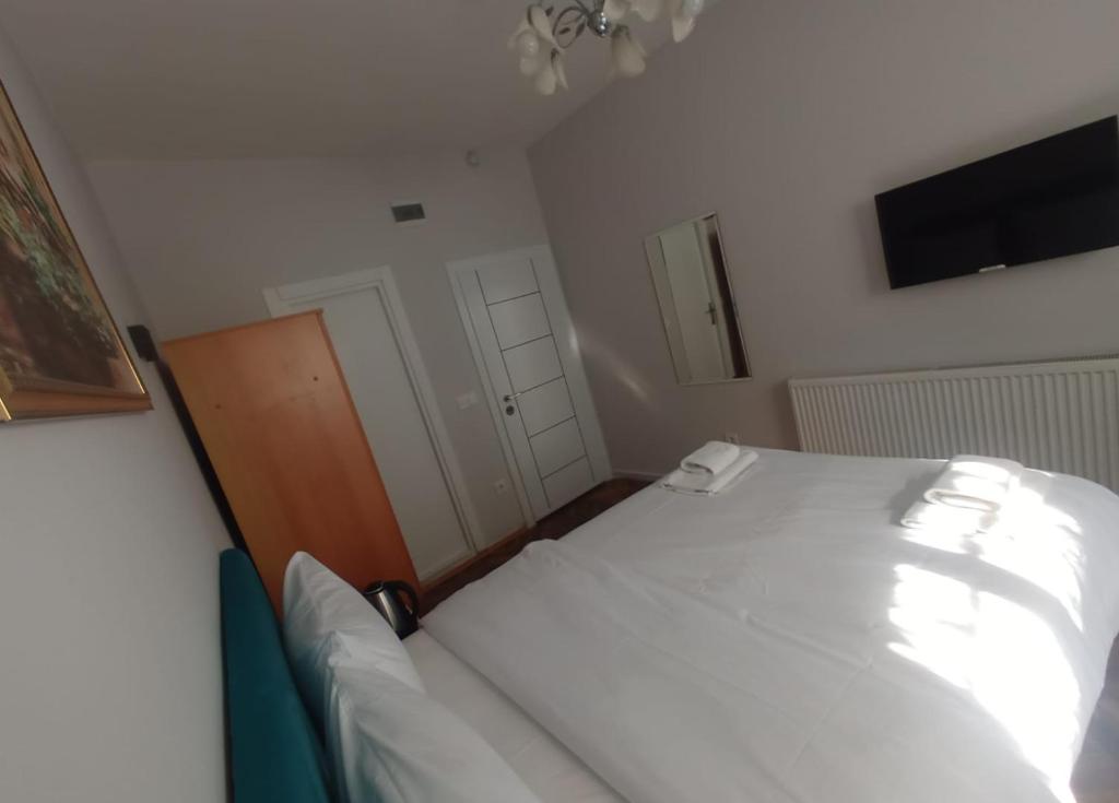 Postel nebo postele na pokoji v ubytování Buyukada Cinar Hotel