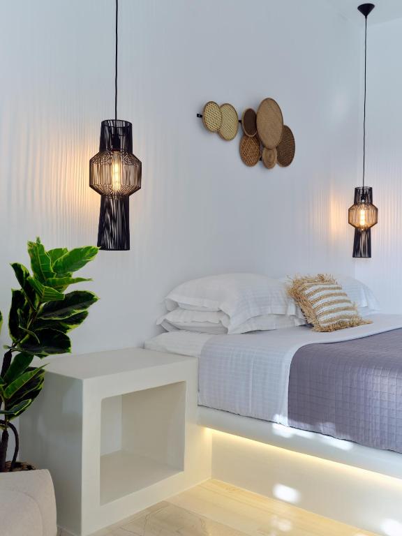 Postel nebo postele na pokoji v ubytování Ariti Seaside Residence