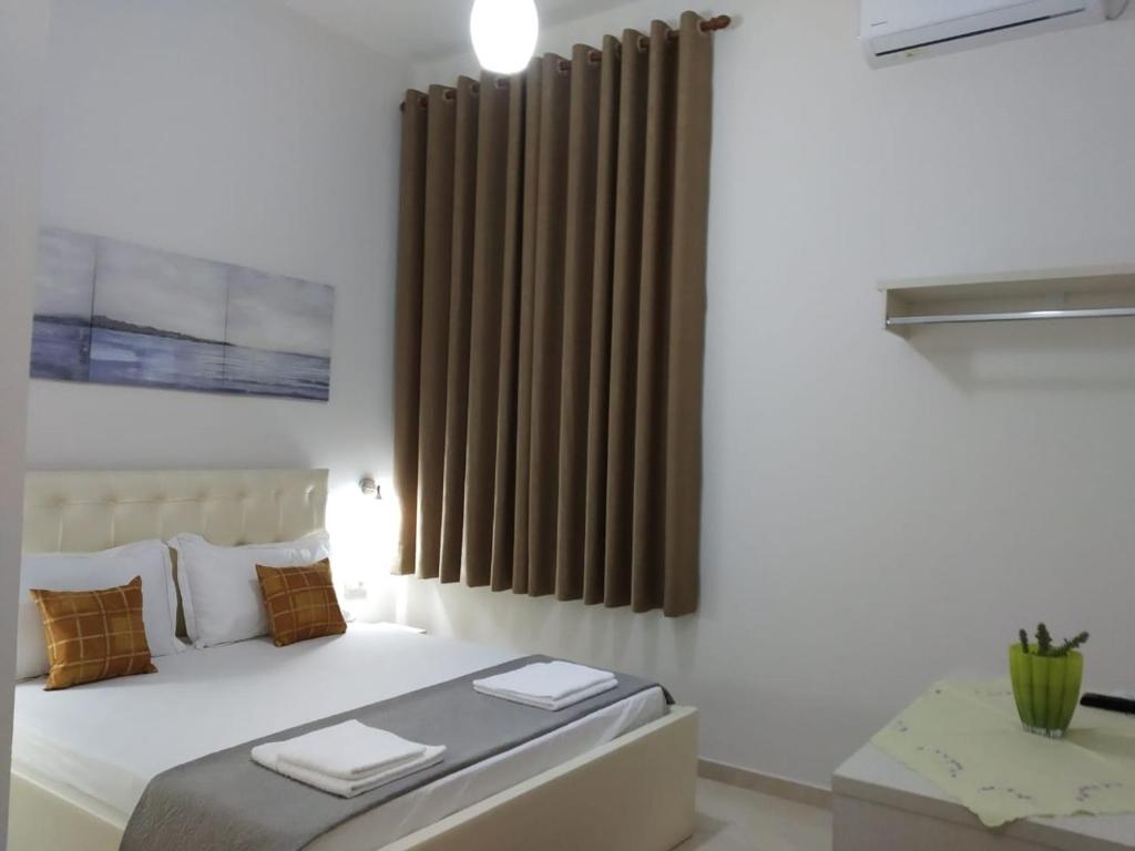 Llit o llits en una habitació de Olive B&B