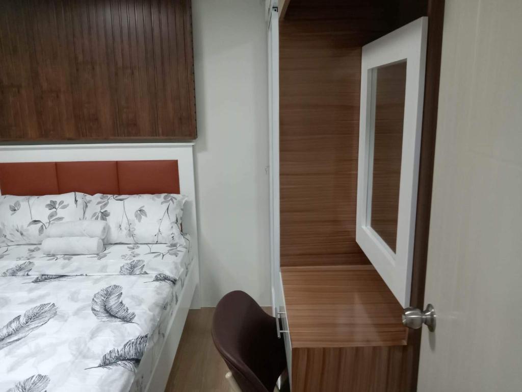 Postel nebo postele na pokoji v ubytování 2 BR Loop Tower 1524