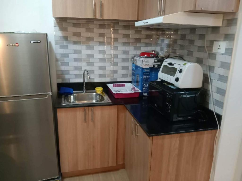 Kuchyň nebo kuchyňský kout v ubytování 2 BR Loop Tower 1524