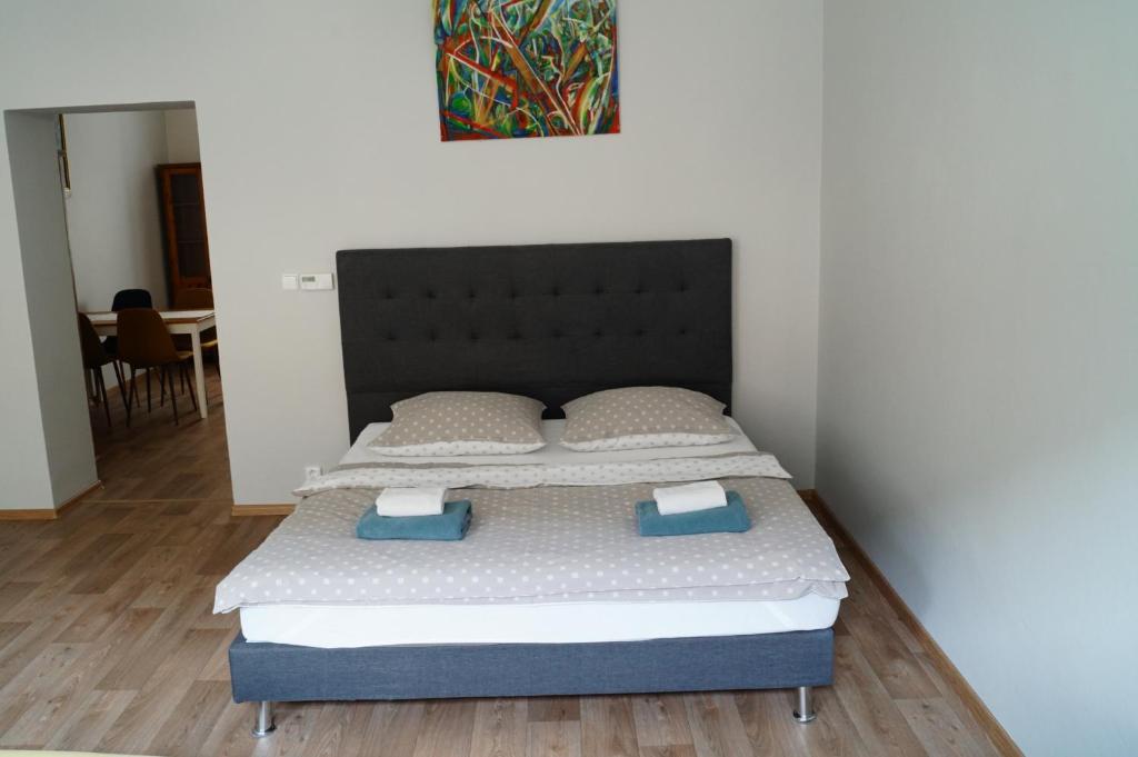 Postel nebo postele na pokoji v ubytování Apartmány Mary