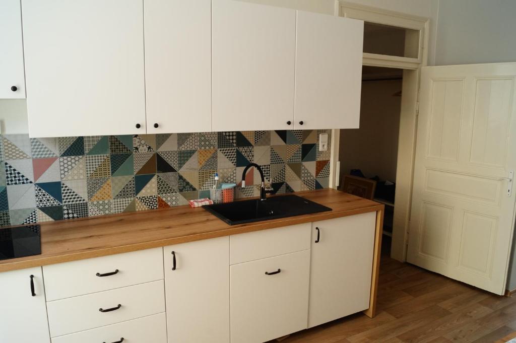 Kuchyň nebo kuchyňský kout v ubytování Apartmány Mary