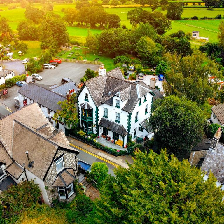 an aerial view of a house in a small town at Crafnant House - Bed & Breakfast in Trefriw
