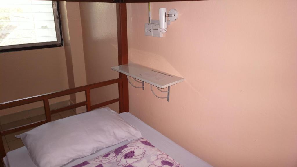 
Bed in Dormitory Room with Air Conditioning
