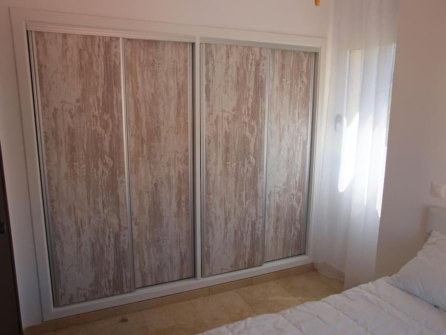 Posteľ alebo postele v izbe v ubytovaní Apartamento Playa Albir
