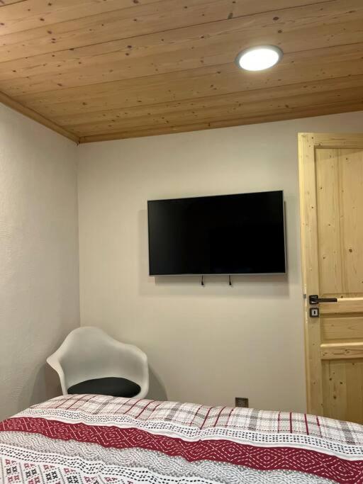 Telewizja i/lub zestaw kina domowego w obiekcie Megeve centre