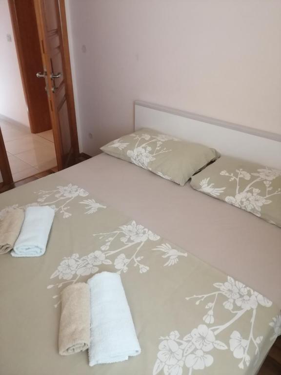 Posteľ alebo postele v izbe v ubytovaní Apartmani Dubrava