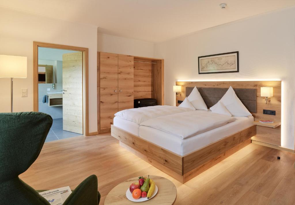 Postel nebo postele na pokoji v ubytování Hotel Weis