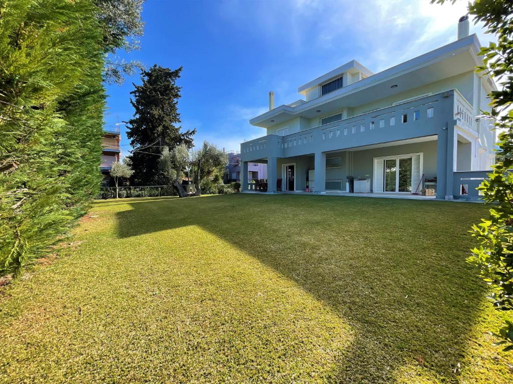 a large yard in front of a house at Greek Aesthetic Manor House in Nea Makri