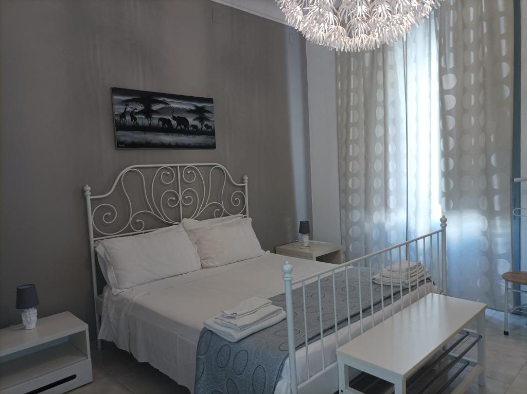 Postel nebo postele na pokoji v ubytování B&B Il Siciliano