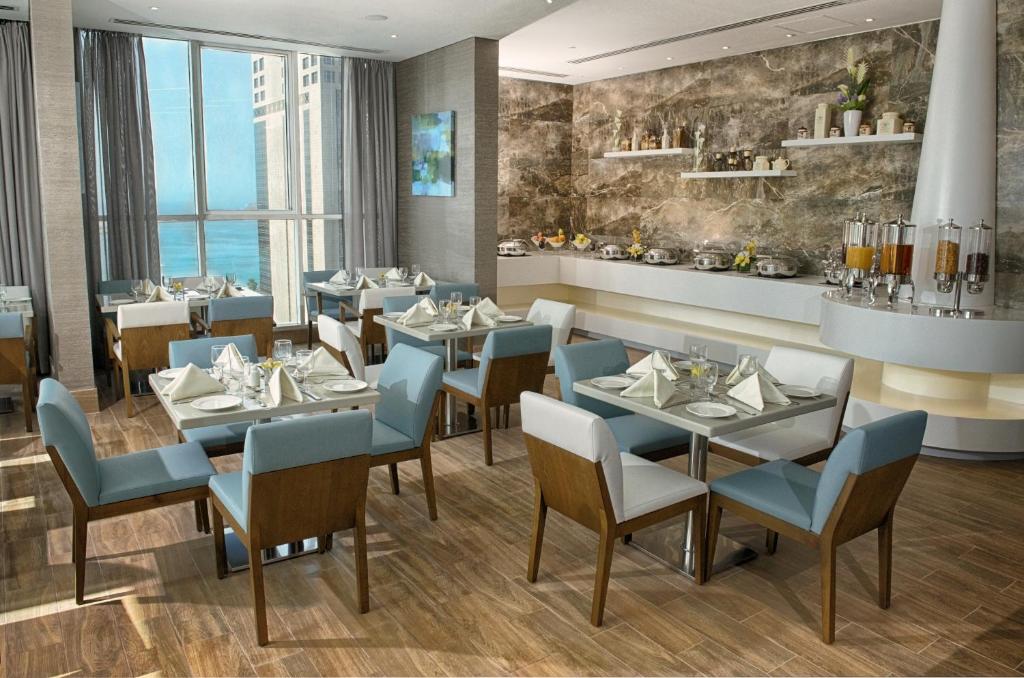Posezení v ubytování TRYP by Wyndham Abu Dhabi City Center